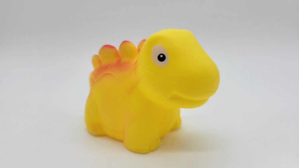 sealed yellow dinosaur bath toy